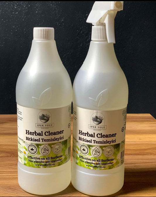 Fles van Herbal Cleaner (Bitkisel Temizleyici) van Mijn winkel, met een effectieve formule voor alle oppervlakken, milieuvriendelijk en natuurlijk.