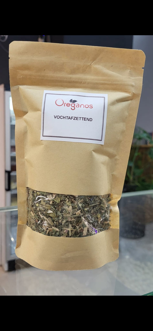 Verpakking van Vochtafzettende Thee van Mijn winkel, met gedroogde kruiden zichtbaar door het venster in de verpakking.
