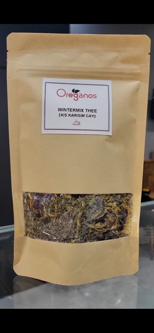 Verpakking van Wintermix Thee van Mijn winkel, een kruidenmix voor de koude wintermaanden. Deze thee bevat een blend van specerijen voor een warme en relaxerende smaak.