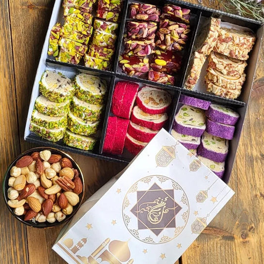 Een mooie selectie van zoet Turks fruit in een geschenkdoos van Mijn winkel, genaamd Box 2. Bevat kleurrijke traktaties, zoals pistache, amandelen en hazelnoten, perfect voor elke gelegenheid.